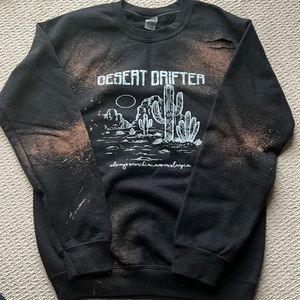 Women’s distressed Small graphic crew neck sweater